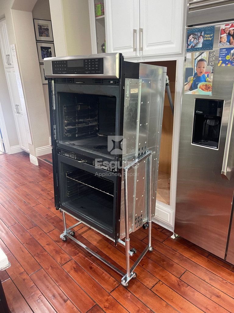 Esquire Appliance Repair technician working on a oven in Orange County